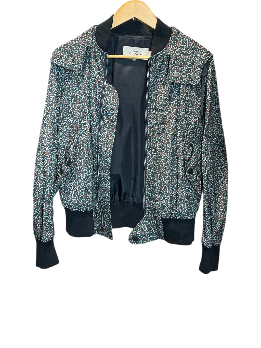 Modify Thrift vintage Coach hooded bomber jacket with teal, pink, and olive ditsy floral print and dark ribbed trim.