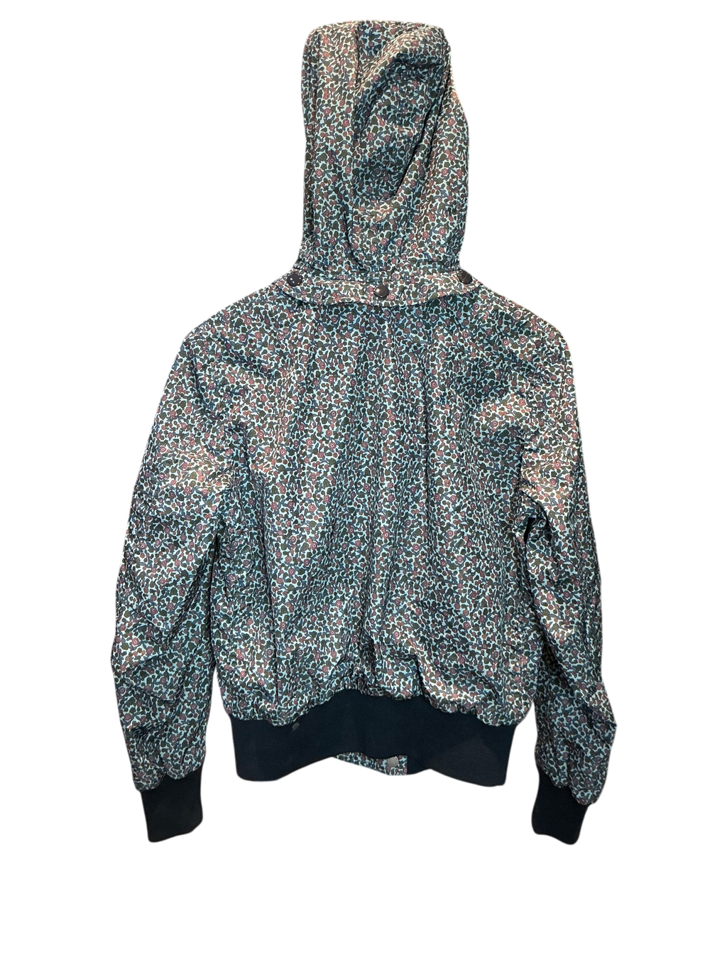 Modify Thrift vintage Coach hooded bomber jacket with a teal, pink, and olive micro-floral print on a dark background.