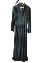 Modify Thrift black maxi dress with a plunging V-neck, high stand collar, gathered bodice, and flared bell sleeves.