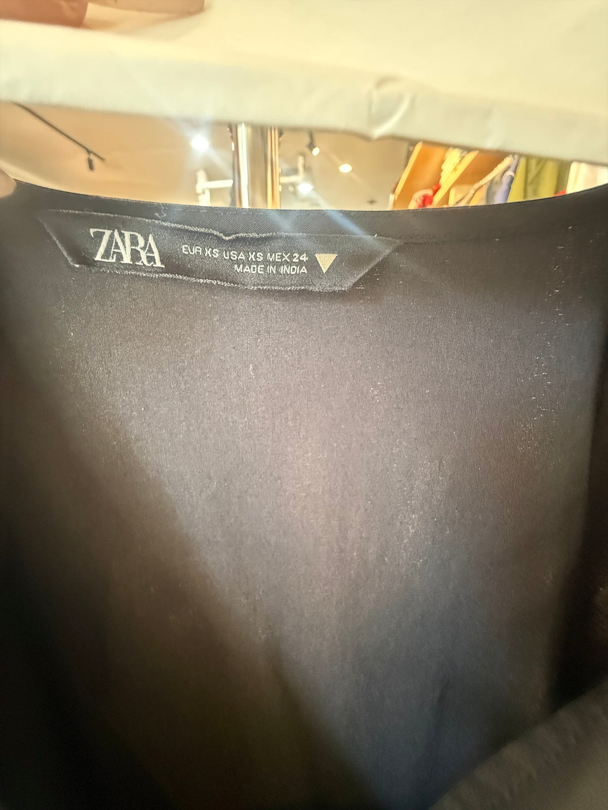 Modify Thrift Zara black midi dress interior brand label showing size XS and country of origin